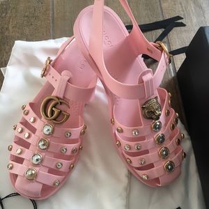 GUCCI
Crystal-embellished jelly sandals